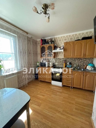 
   Продам 2-комнатную, 56.3 м², Строителей ул

. Фото 3.